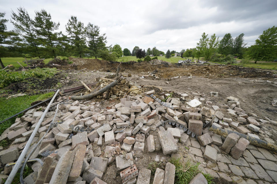 These are the remains of a home that was demolished to clear land that will be occupied by a proposed $20 billion Intel processor plant in Johnstown, Ohio, Thursday, June 9, 2022. Intel announced the Ohio development in January, part of the company's efforts to alleviate a global shortage of chips powering everything from phones to cars to home appliances. (AP Photo/Gene J. Puskar)