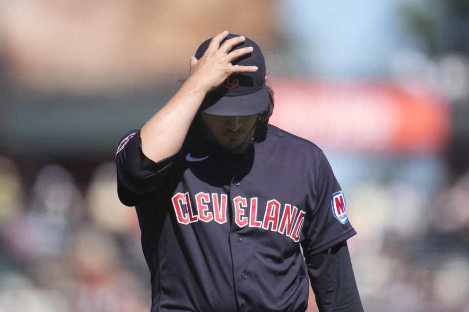 Cleveland Guardians pitcher Eli Morgan walks off the field after being relieved during the eighth inning of a baseball game against the San Francisco Giants in San Francisco, Wednesday, Sept. 13, 2023. (AP Photo/Jeff Chiu)