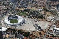 An aerial view shows the Arena das Dunas stadium, which will host matches for the 2014 soccer World Cup, in Natal January 22, 2014. REUTERS/Sergio Moraes