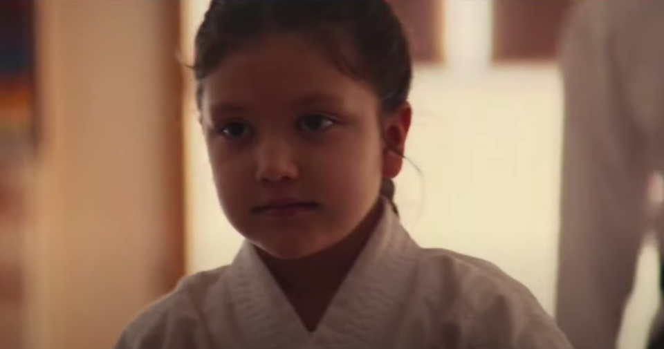 Close-up of young girl not smiling