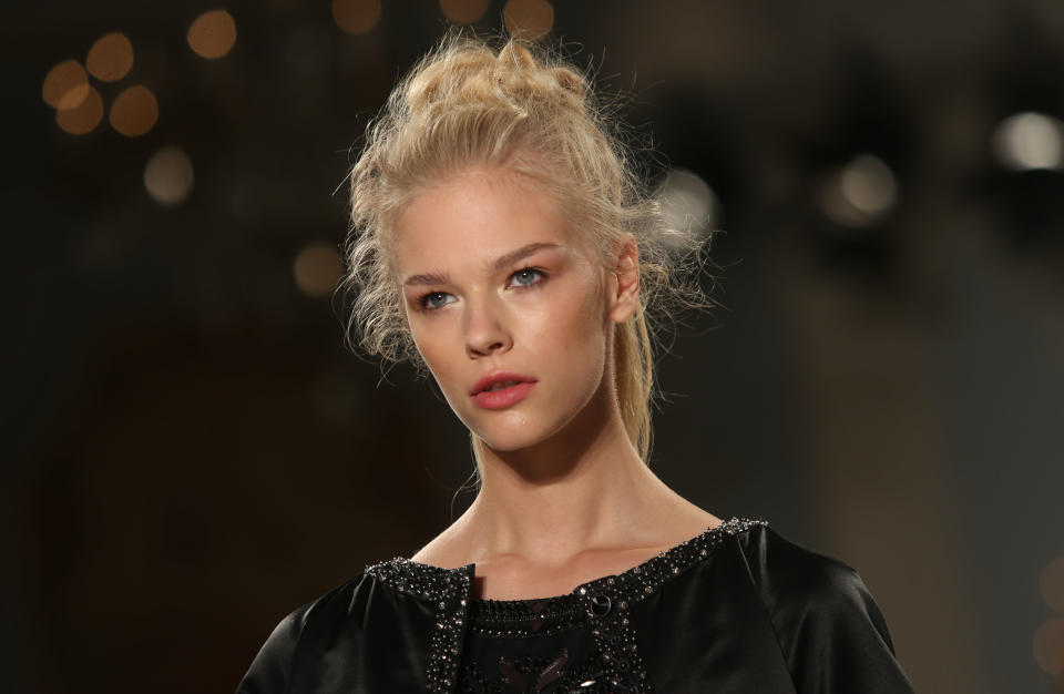 A Model wears a design created by Temperley London during London Fashion Week Spring/Summer 2014, at the Savoy Hotel in central London, Sunday, Sept 15, 2013. (Photo by Joel Ryan/Invision/AP)