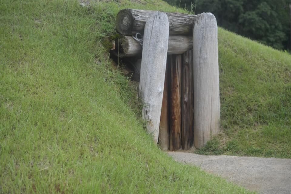 The entrance to the Earth Lodge, where Native Americans held council meetings for 1,000 years until their forced removal in the 1820s, in Macon, Ga., is seen on Aug. 22, 2022. The lodge would be a highlight of the Ocmulgee National Park and Preserve. (AP Photo/Sharon Johnson)