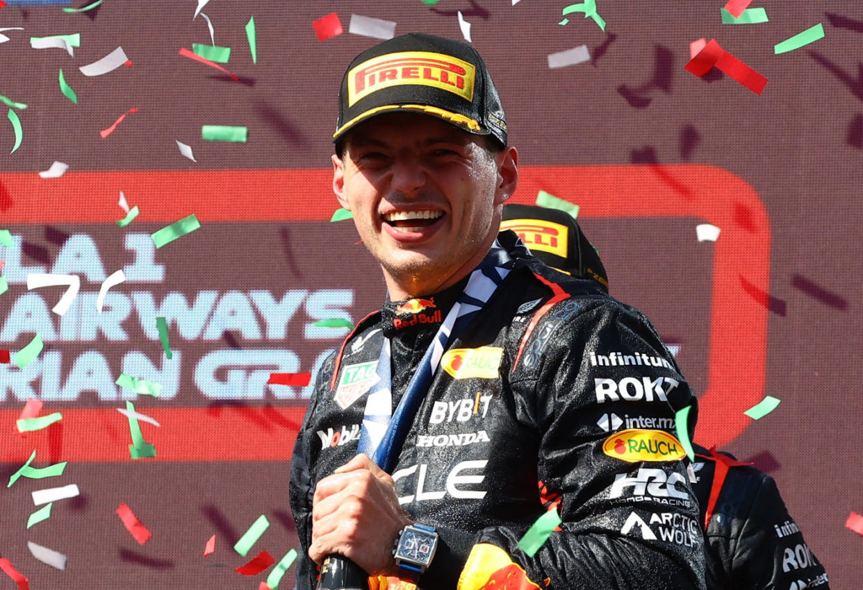 Formula One F1 - Hungarian Grand Prix - Hungaroring, Budapest, Hungary - July 23, 2023 Red Bull's Max Verstappen celebrates on the podium after winning the Hungarian Grand Prix REUTERS/Bernadett Szabo