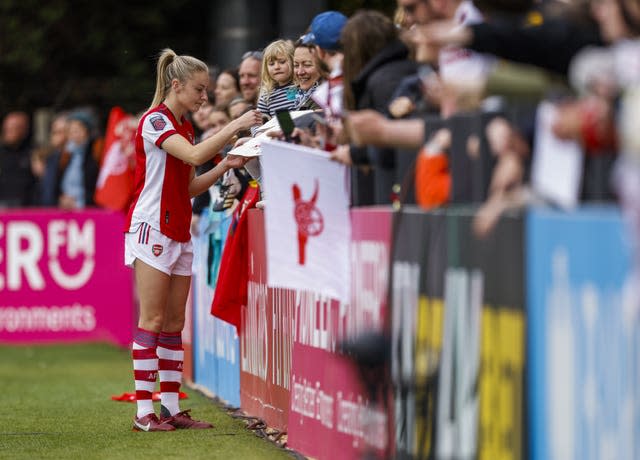 Arsenal defender Leah Williamson signs autographs for fans