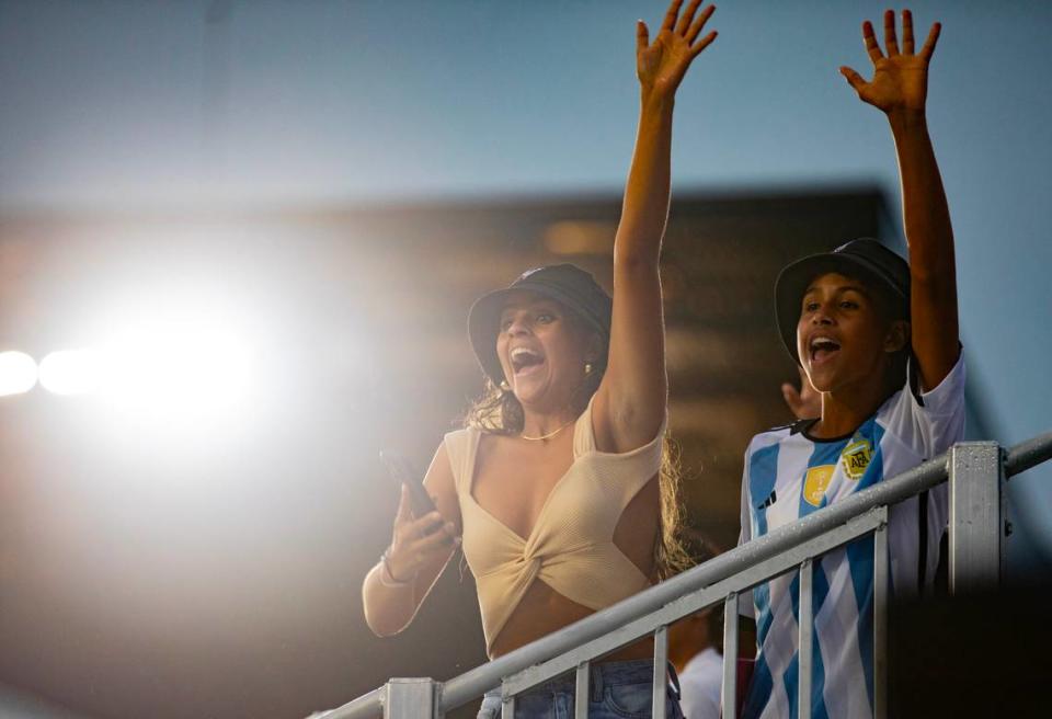 Attendees cheer and wave during The Unveil event, where Lionel Messi was welcomed to MLS and the Inter Miami CF team, at DRV PNK Stadium on Sunday, July 16, 2023 in Fort Lauderdale, Fla. Lauren Witte/lwitte@miamiherald.com