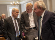 Defense attorney Jim Griffin, left, Alex Murdaugh, center, and Dick Harpootlian talk on a break during Murdaugh's double murder trial at the Colleton County Courthouse in Walterboro, S.C., Wednesday, Feb. 1, 2023. (Andrew J. Whitaker/The Post And Courier via AP, Pool)