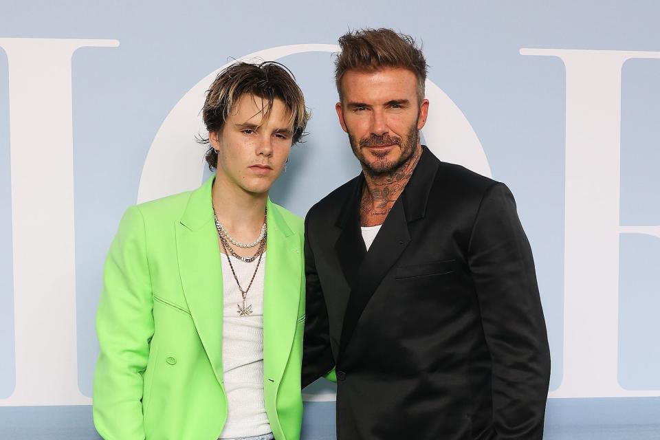 Cruz Beckham and David Beckham attend the Dior Homme Menswear Spring Summer 2023 show as part of Paris Fashion Week on June 24, 2022 in Paris, France.