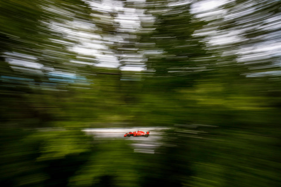 Gone in a blur: Sebastian Vettel on his way to victory at the 2018 Canadian Grand Prix