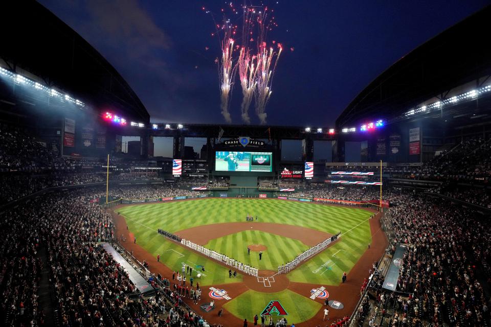 Fireworks go off after the the national anthem at Chase Field in Arizona.