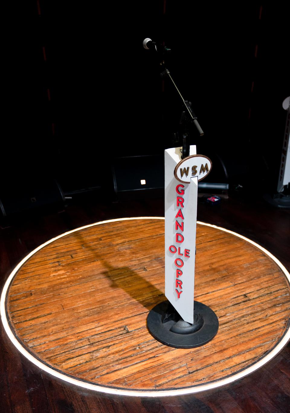 A mic stand sits at the front of the newly renovated Grand Ole Opry stage on Feb 4, 2023; Nashville, TN, USA;  Mandatory Credit: Sarah White-The Tennessean