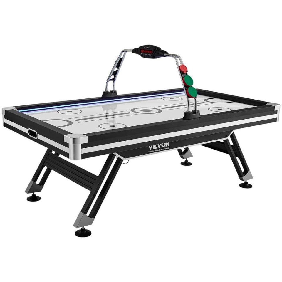 <p><a href="https://go.redirectingat.com?id=74968X1596630&url=https%3A%2F%2Fwww.homedepot.com%2Fp%2FAir-Powered-Hockey-Table-89-in-Indoor-Hockey-Table-for-Kids-and-Adults-LED-Sports-Hockey-Game-DZJFKQQGQZ89KTOVDV1%2F328645320&sref=https%3A%2F%2Fwww.menshealth.com%2Ftechnology-gear%2Fg60756418%2Fbest-air-hockey-tables%2F" rel="nofollow noopener" target="_blank" data-ylk="slk:Shop Now;elm:context_link;itc:0;sec:content-canvas" class="link ">Shop Now</a></p><p>Air-Powered Hockey Table 89 in. Indoor Hockey Table for Kids and Adults LED Sports Hockey Game</p><p>homedepot.com</p><p>$847.99</p>