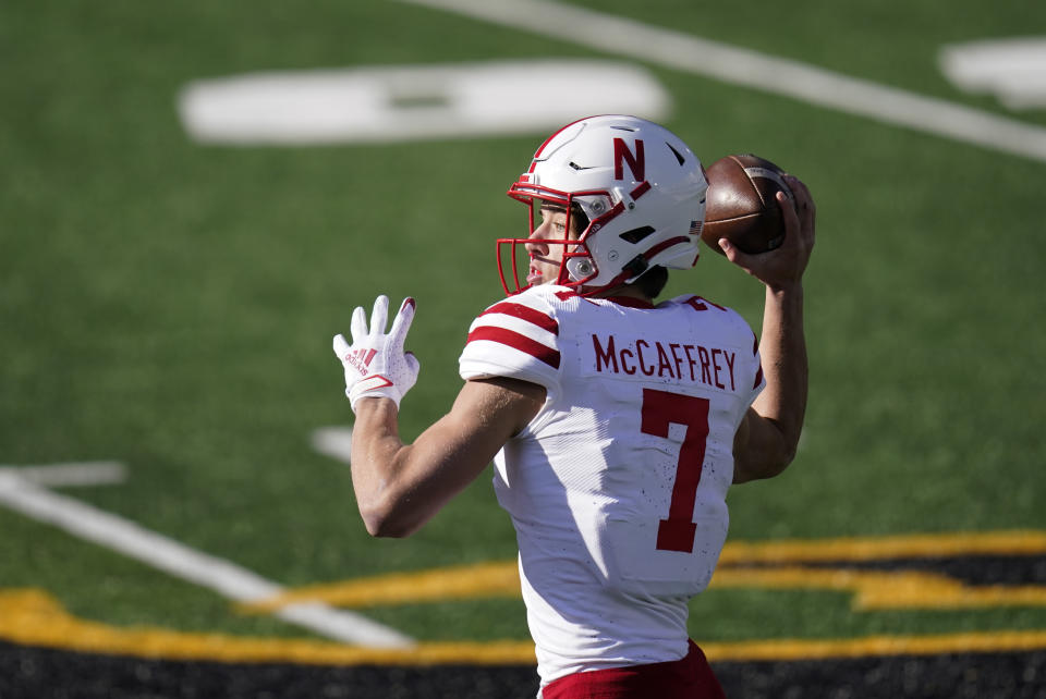 Nebraska quarterback Luke McCaffrey throws a pass during the first half of an NCAA college football game against Iowa, Friday, Nov. 27, 2020, in Iowa City, Iowa. (AP Photo/Charlie Neibergall)