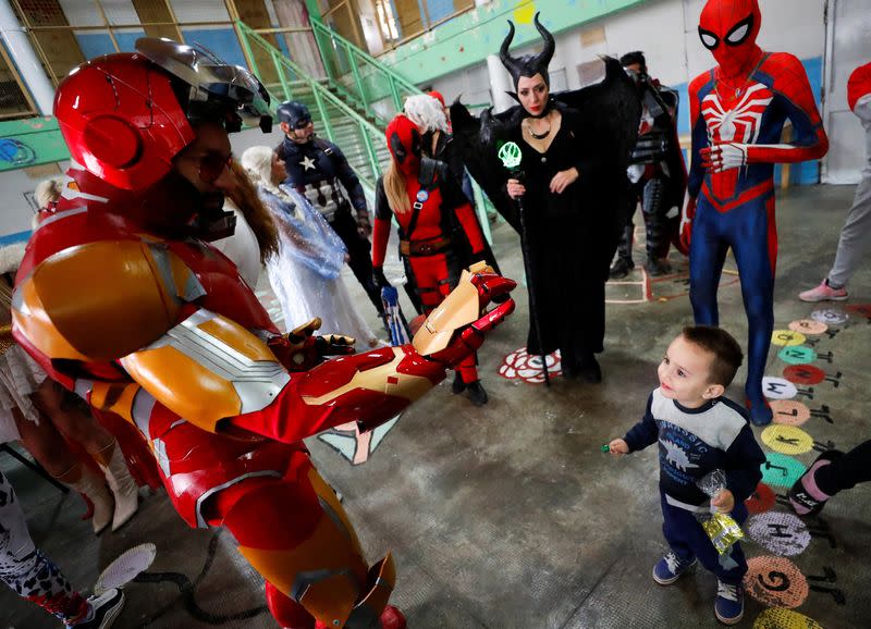 Argentine superheroes cheer up the children of prison inmates