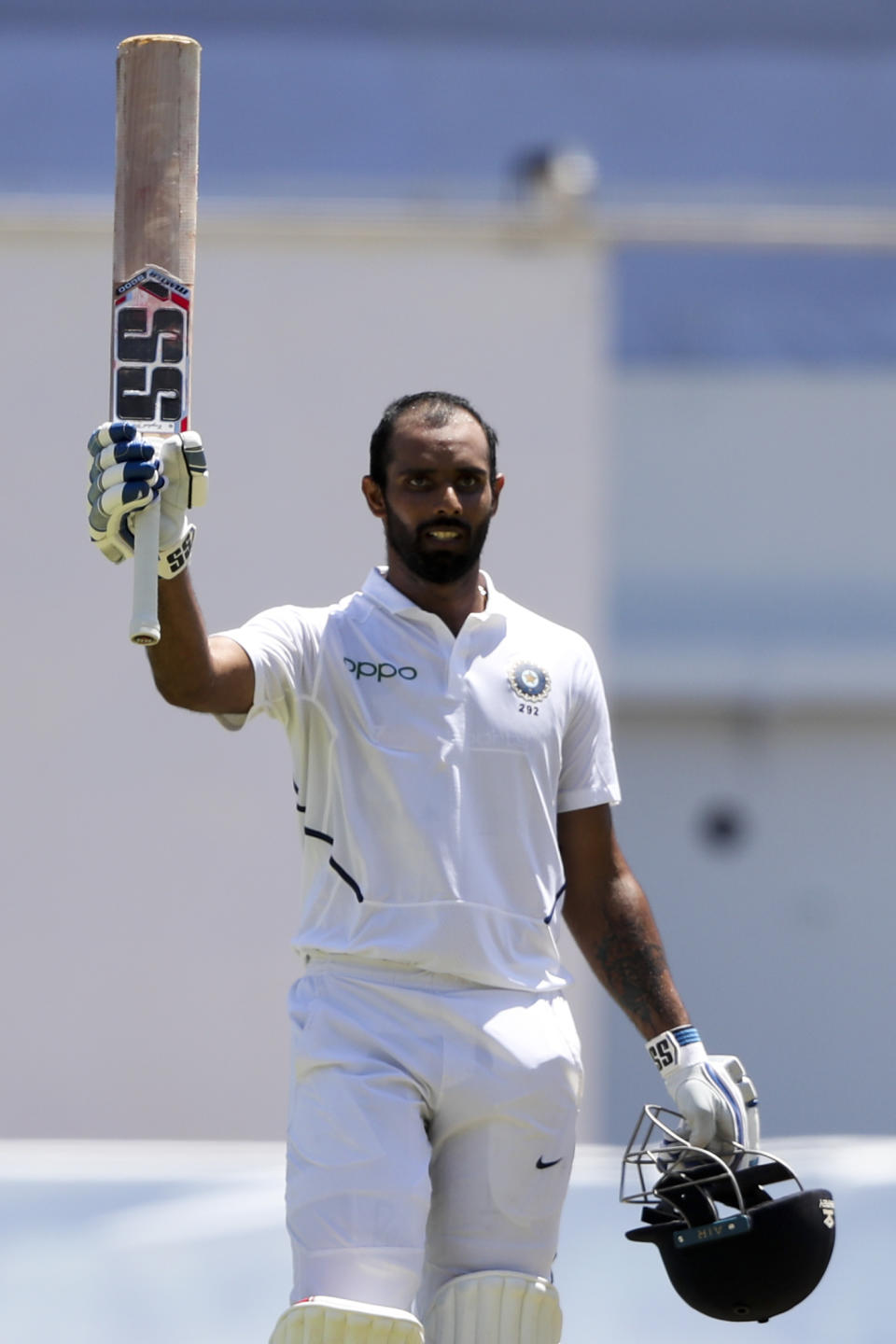 India's Hanuma Vihari celebrates after he scored a century against West Indies during day two of the second Test cricket match at Sabina Park cricket ground in Kingston, Jamaica Saturday, Aug. 31, 2019. (AP Photo/Ricardo Mazalan)