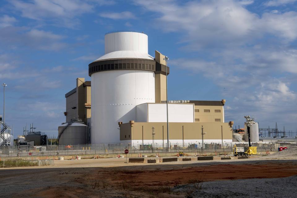 In this image provided by Georgia Power, the outside of the Unit 3 reactor containment building at Plant Vogtle in Waynesboro, Ga., is shown on Thursday, Oct. 13, 2022. Georgia Power Co. and the other owners of the $30 billion nuclear plant expansion began loading 90 tons of uranium oxide into the first of two new reactors on Friday, Oct. 14, 2022, aiming to begin generating electricity by March 2023. (Georgia Power Co. via AP)