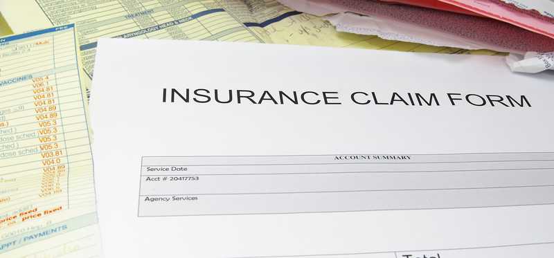 A paper insurance claim form.