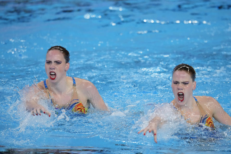 Bregje de Brouwer and Noortje de Brouwer, of the Netherlands, compete in the women's duet free final of artistic swimming at the World Aquatics Championships in Doha, Qatar, Thursday, Feb. 8, 2024. (AP Photo/Lee Jin-man)