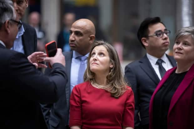 Deputy Prime Minister Chrystia Freeland and B.C Premier David Eby tour a clean electricity research and development facility in Surrey, B.C., on Thursday. (Ben Nelms/CBC)