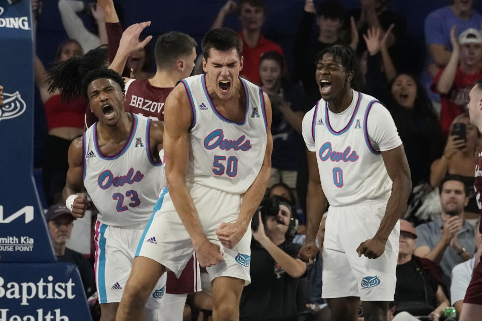 Florida Atlantic center Vladislav Goldin (50) reacts after scoring during the second half of an NCAA college basketball game against Charleston, Saturday, Dec. 2, 2023, in Boca Raton, Fla. Florida Atlantic defeated Charleston 90-74. (AP Photo/Marta Lavandier)