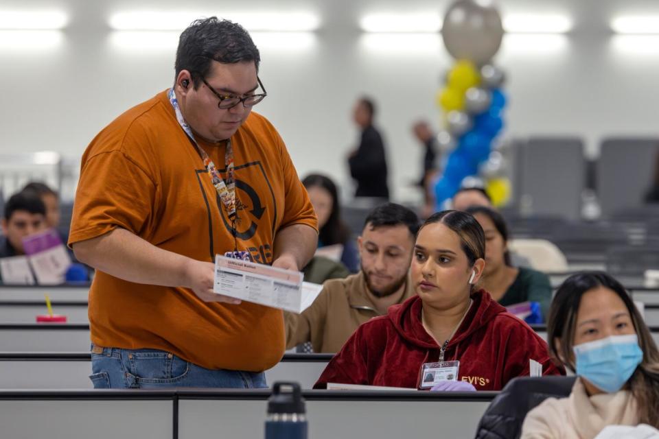 Workers inside L.A. County's new ballot processing center.