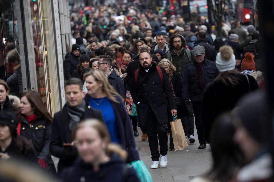 Christmas shoppers on Oxford Street at the weekend (REUTERS)