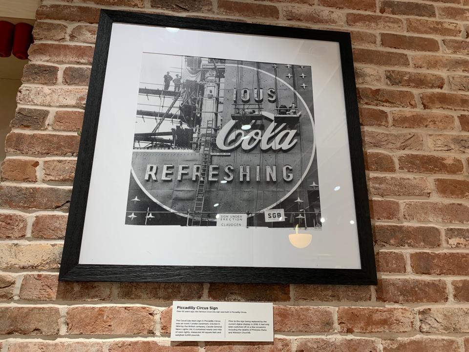 A framed picture of the neon Coca-Cola sign previously erected in Piccadilly Circus, London.