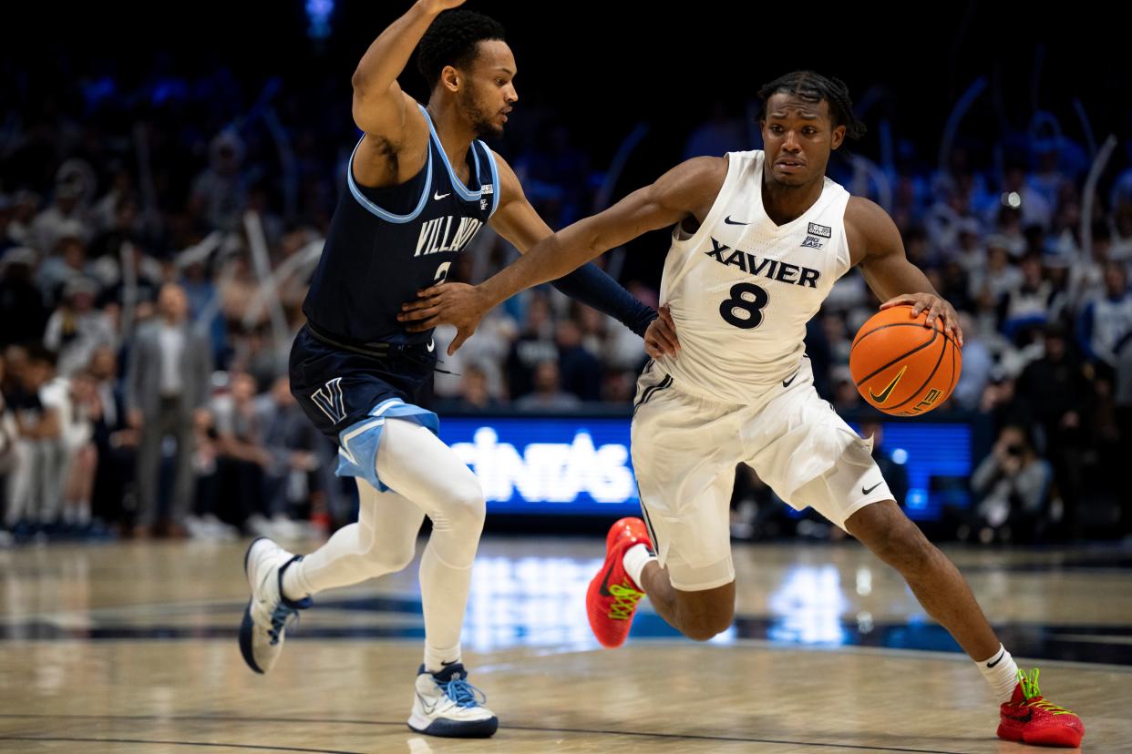 Villanova Wildcats guard Mark Armstrong (2) guards Xavier Musketeers guard Quincy Olivari (8) in the second half of the NCAA basketball game between Xavier Musketeers and Villanova Wildcats at the Cintas Center in Cincinnati on Wednesday, Feb. 7, 2024.