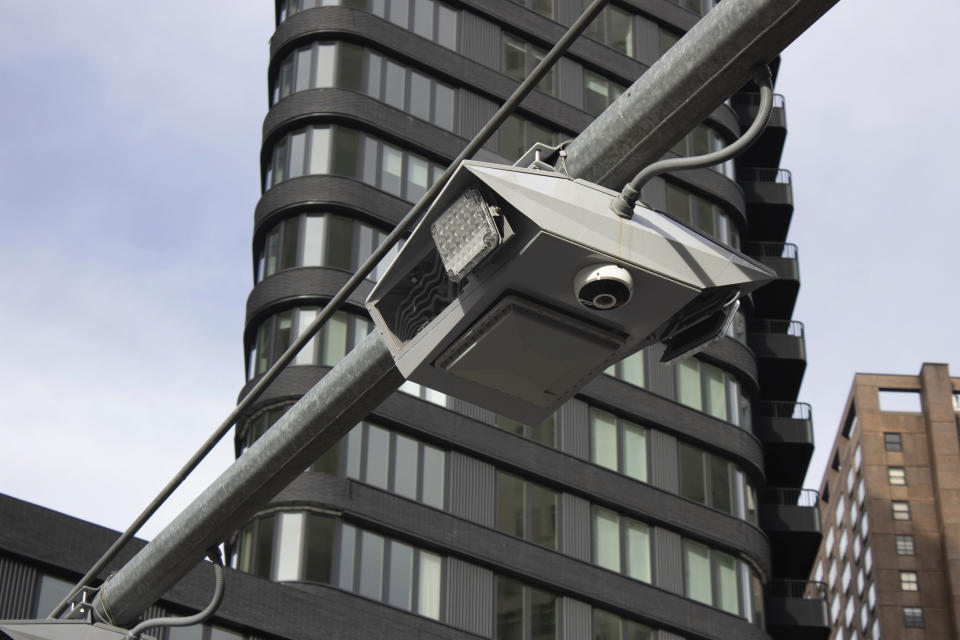 FILE - Recently installed toll traffic cameras hang above West End Ave. near 61st Street in the Manhattan borough of New York, Friday, Nov. 16, 2023. The start date for the $15 toll most drivers will be charged to enter Manhattan's central business district will be June 30, transit officials said Friday, April 26, 2024. (AP Photo/Ted Shaffrey, File)