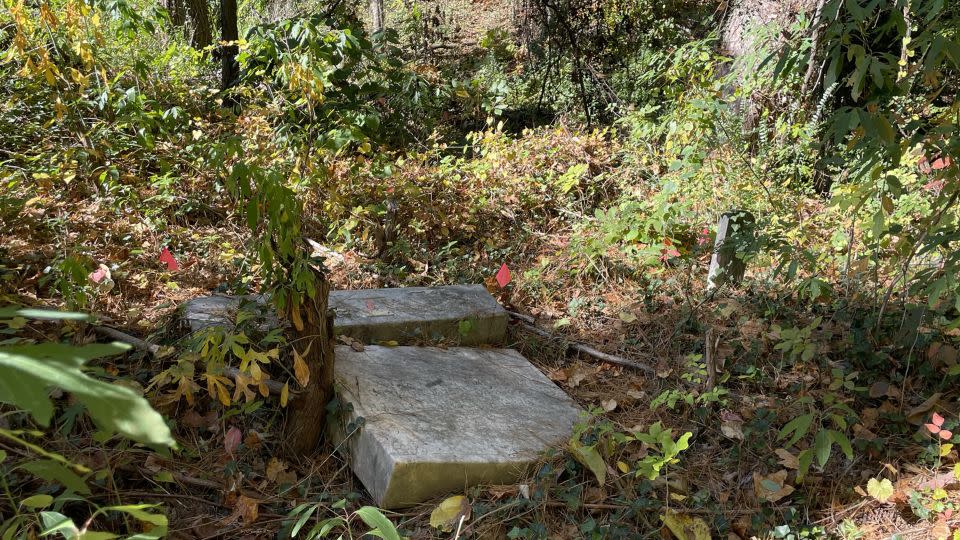 A broken headstone is seen at the Piney Grove Cemetery in Atlanta. - Georgia Trust for Historic Preservation