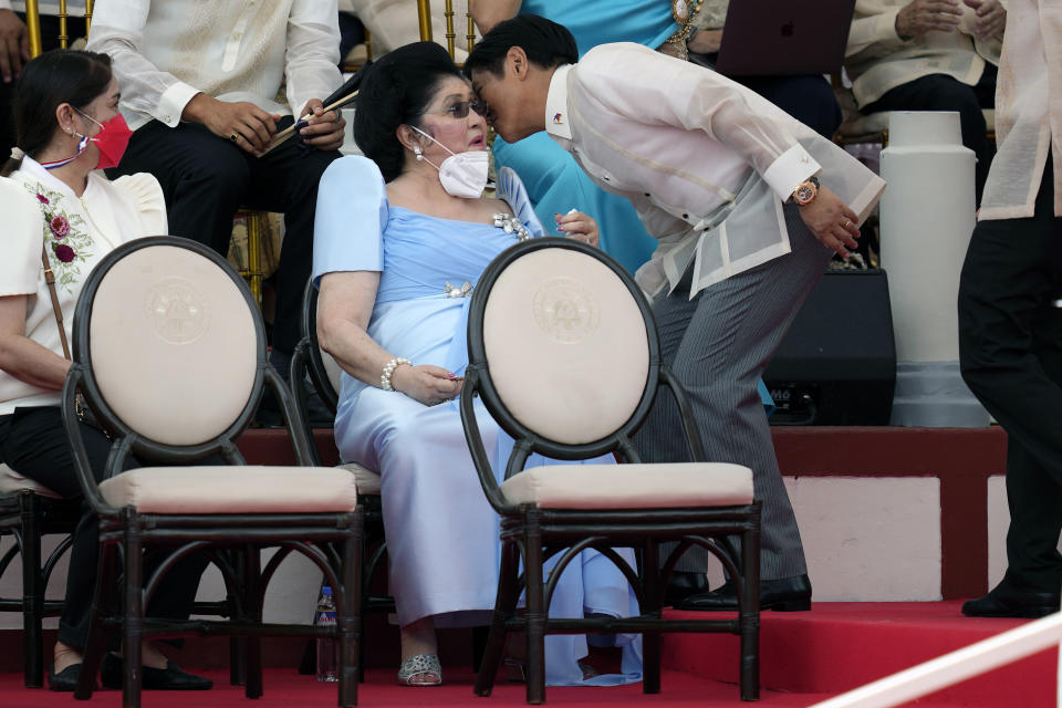 Imelda Marcos, center, mother of President-elect Ferdinand "Bongbong" Marcos Jr. attends the inauguration ceremony at National Museum on Thursday, June 30, 2022 in Manila, Philippines. Ferdinand Marcos was sworn in as the country's 17th president. (AP Photo/Aaron Favila)