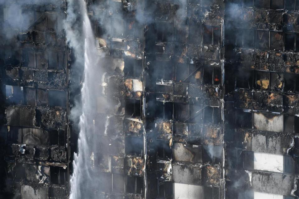 The blaze broke out in the early hours of June 14. (EPA)