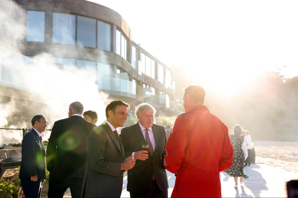 Emmanuel Macron and Boris Johnson speak with Red Arrows pilot (Simon Dawson / No 10 Downing Street)