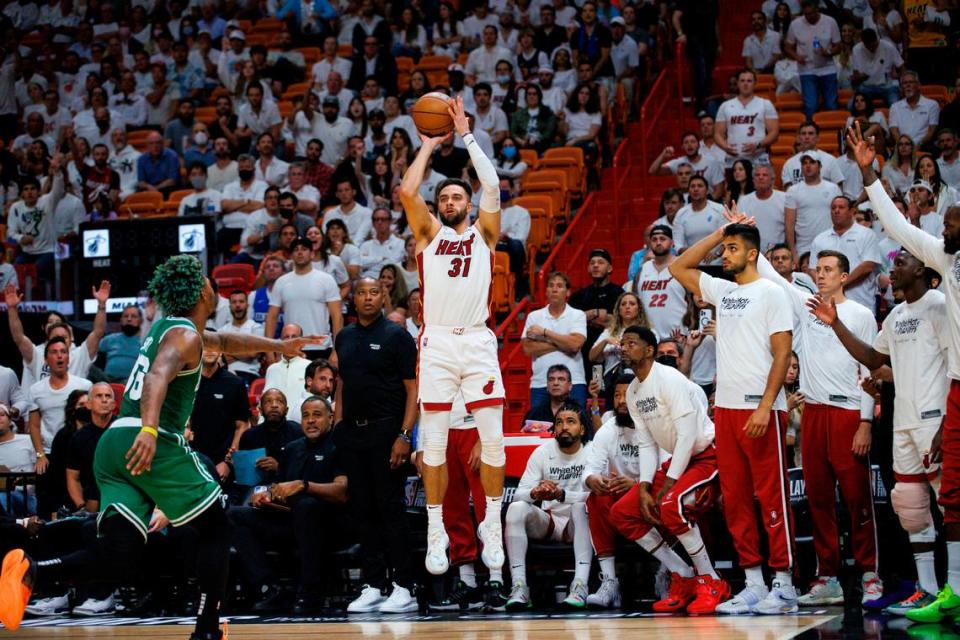 Miami Heat guard Max Strus (31) hits a three-pointer against Boston Celtics guard Marcus Smart (36) during the third quarter of Game 7 of the NBA Eastern Conference Finals series at FTX Arena in Miami, Florida, on Sunday, May 29, 2022. (David Santiago/Miami Herald/Tribune News Service via Getty Images)