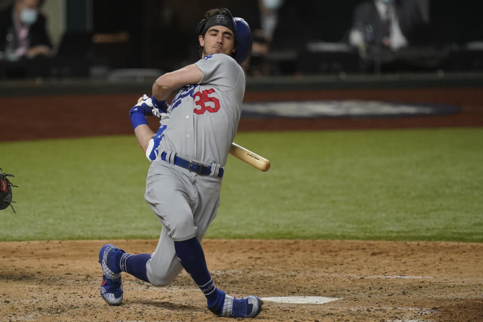 Los Angeles Dodgers' Cody Bellinger swings during the sixth inning in Game 4 of the baseball World Series Tampa Bay Rays Saturday, Oct. 24, 2020, in Arlington, Texas. (AP Photo/Eric Gay)