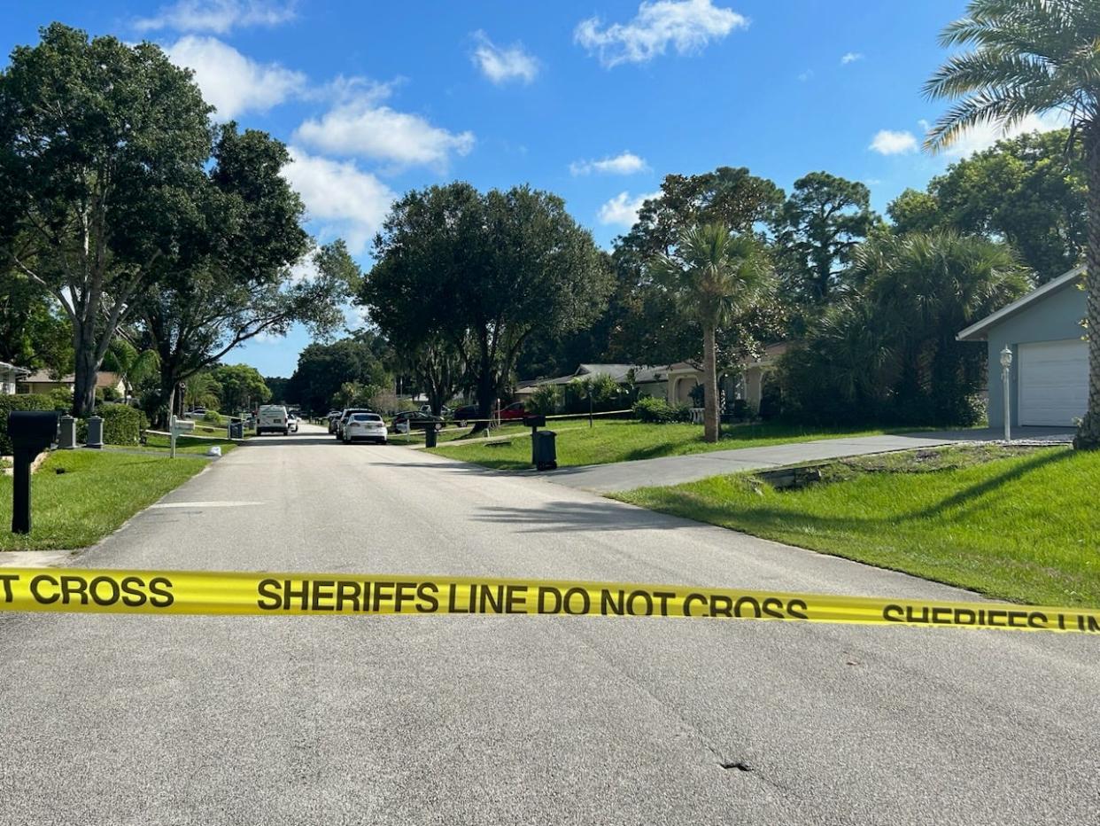 Police tape blocks the area of a recent shooting that killed one person on Blare Drive in Palm Coast Monday, Aug. 14, 2023.