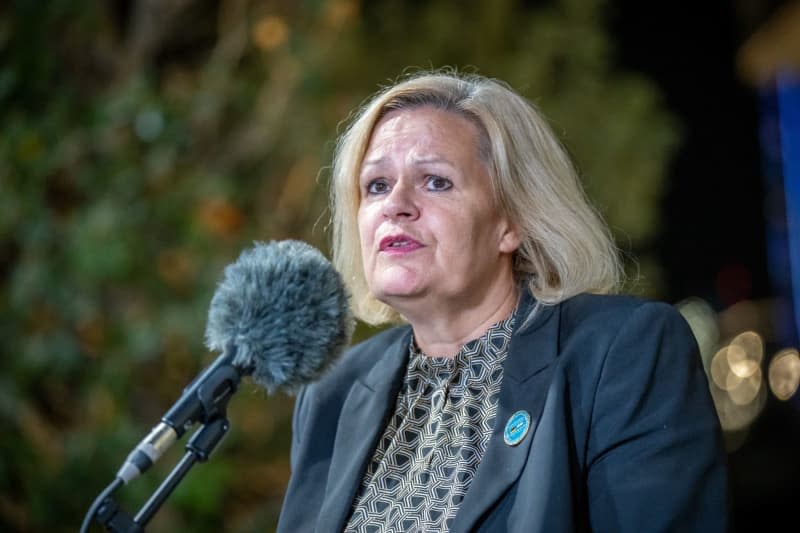 Nancy Faeser, Germany's Interior Minister, speaks after signing a migration agreement with Uzbekistan. Michael Kappeler/dpa