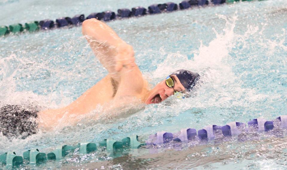 Granville's Eli Winterhalter swims the 100 freestyle during a meet with Johnstown, Northridge and Grandview Heights on Monday.