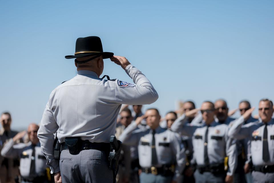 A new El Paso County sheriff will be chosen in the 2024 election. In this photo, sheriff's deputies salute during the annual County Law Enforcement Memorial Ceremony outside El Paso County Sheriff's Office Headquarters in 2022.