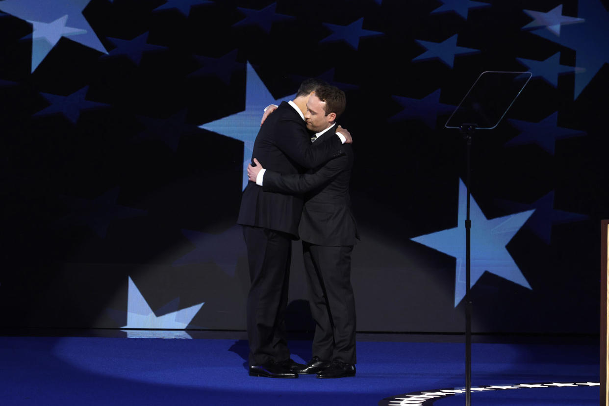 Second gentleman Doug Emhoff (L) greets his son Cole Emhoff as he arrives to speak on stage during the second day of the Democratic National Convention at the United Center on Aug. 20, 2024 in Chicago, Illinois.  (Chip Somodevilla / Getty Images)