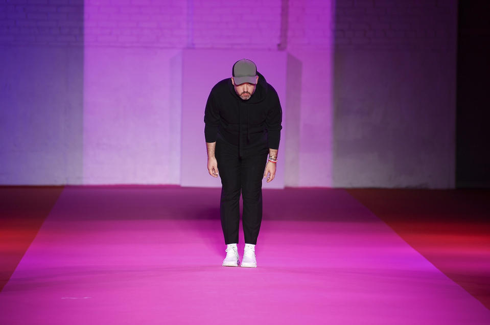 Fashion designer Brandon Maxwell takes a bow after his spring/summer 2022 fashion show in the Brooklyn borough of New York during Fashion Week on Friday, Sept. 10, 2021. (Photo by Evan Agostini/Invision/AP)