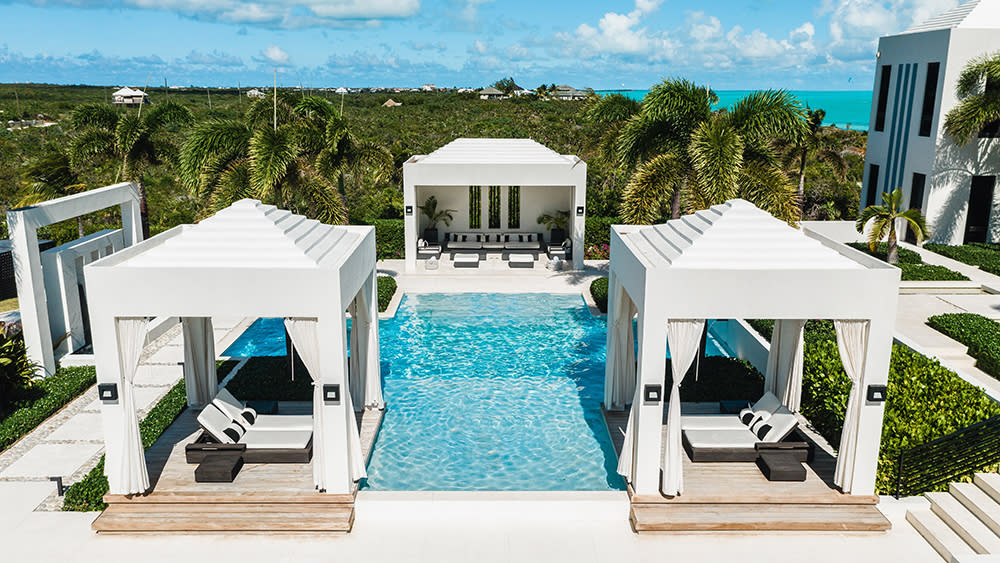 Pool and cabanas at the front of Triton Luxury Villa - Credit: The Agency Turks & Caicos