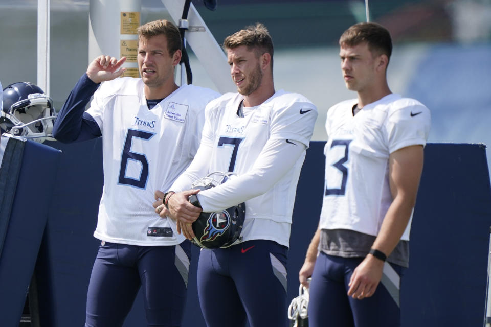 FILE - Tennessee Titans punter Brett Kern (6) talks with place kickers Greg Joseph (7) and Tucker McCann (3) during NFL football training camp Tuesday, Aug. 18, 2020, in Nashville, Tenn. The Tennessee Titans have made a switch at kicker agreeing to terms with veteran Stephen Gostkowski and waiving Greg Joseph. The Titans announced the move Thursday morning, Sept. 3, 2020. (AP Photo/Mark Humphrey, FIle)