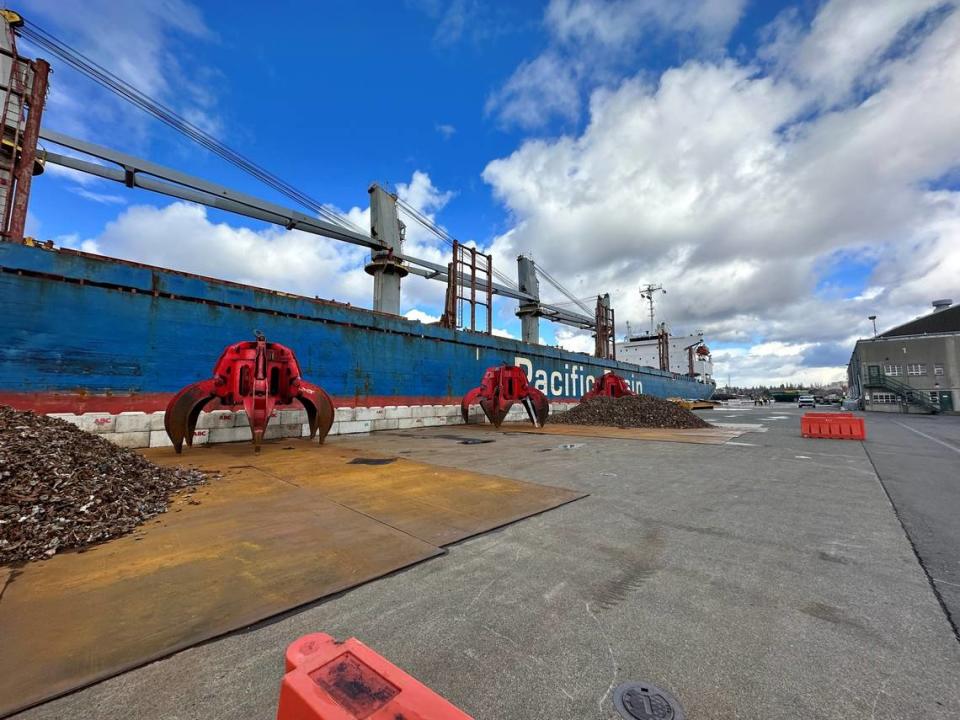 Piles of scrap metal are loaded onto the Kaiti Hill bulk carrier, which arrived at the Bellingham Shipping Terminal Sunday, Feb. 26, 2023, as part of an ongoing recycling program.