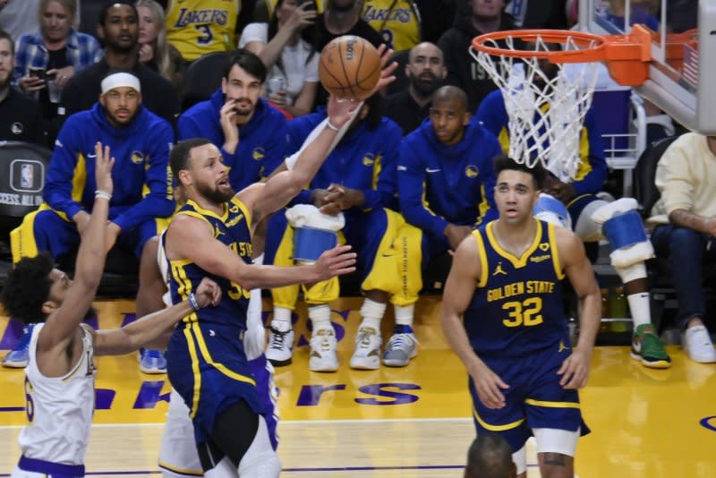 Guard Stephen Curry (C) and the Golden State Warriors will battle the Sacramento Kings in the first round of the NBA play-in tournament. File Photo by Jim Ruymen/UPI