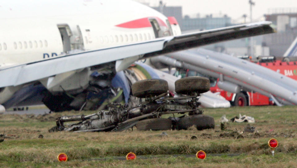 FILE -This Thursday Jan. 17, 2008 file photo, shows the undercarriage from a British Airways Boeing 777 plane flying from China that landed short of the runway at London's Heathrow Airport. An official report said Thursday Sept 4, 2008, that ice in fuel lines probably caused the British Airways jet to lose power and make a jarring emergency landing in London in January. (AP Photo/Tom Hevezi)