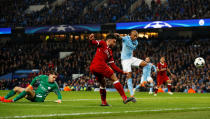 <p>Soccer Football – Champions League Quarter Final Second Leg – Manchester City vs Liverpool – Etihad Stadium, Manchester, Britain – April 10, 2018 Liverpool’s Alex Oxlade-Chamberlain shoots at goal after rounding Manchester City’s Ederson Action Images via Reuters/Jason Cairnduff </p>