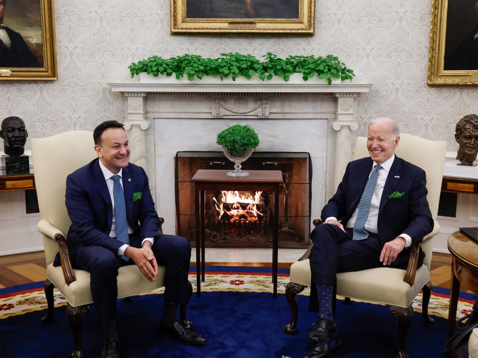 President Joe Biden and Irish Taoiseach Leo Varadkar speak to one another in the Oval Office of the White House on March 17, 2023