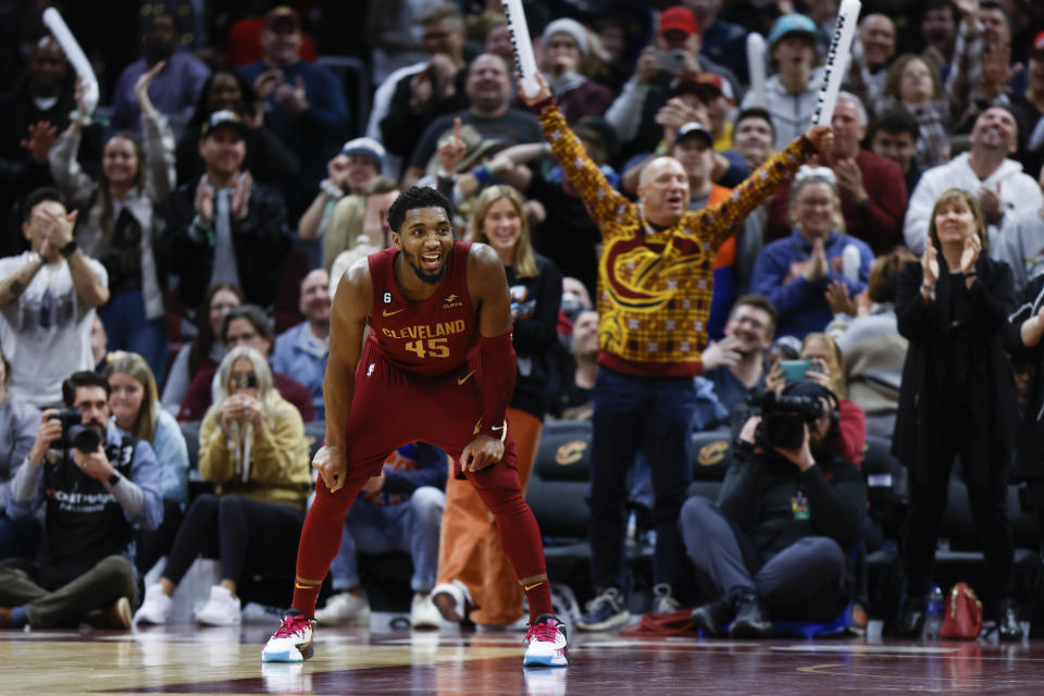 Cleveland Cavaliers guard Donovan Mitchell (45) smiles during overtime of an NBA basketball game against the Chicago Bulls, Monday, Jan. 2, 2023, in Cleveland. (AP Photo/Ron Schwane)