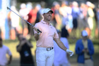 Rory McIlroy, of Northern Ireland, looks at a shot on the 15th hole during the first round of the BMW Championship golf tournament at Wilmington Country Club, Thursday, Aug. 18, 2022, in Wilmington, Del. (AP Photo/Nick Wass)