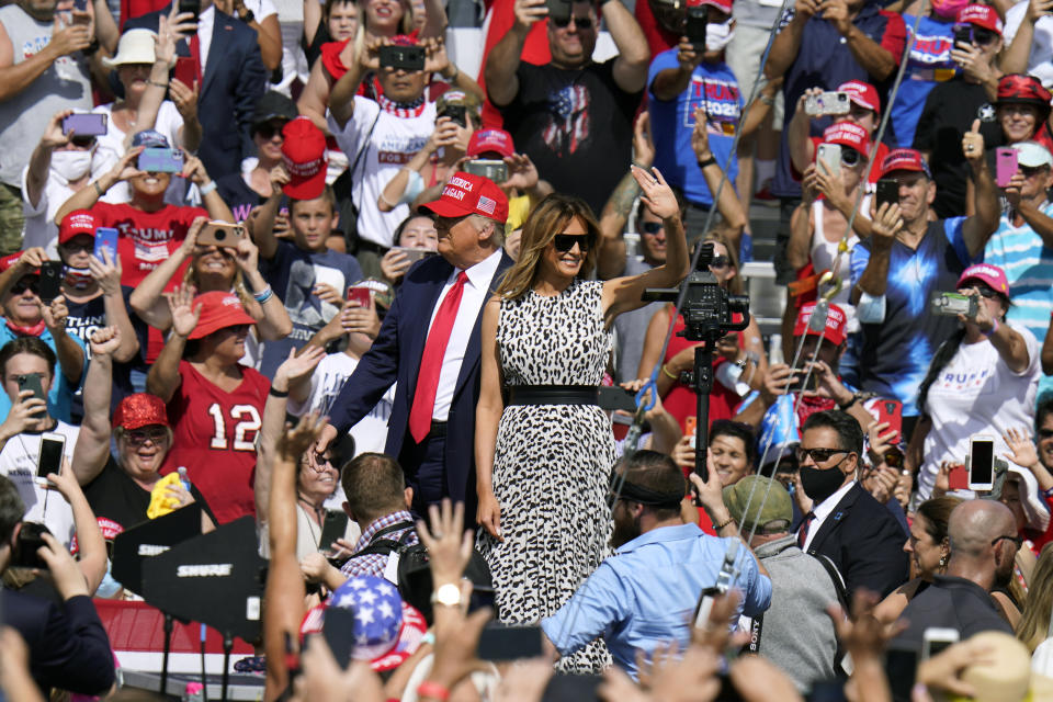 President Donald Trump and first lady Melania Trump arrive for a campaign rally Thursday, Oct. 29, 2020, in Tampa, Fla. (AP Photo/Chris O'Meara)